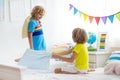 Kids pillow fight. Bedroom for two children Royalty Free Stock Photo