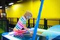 Kids play air hockey. Fun arcade games Royalty Free Stock Photo