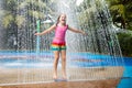 Kids play in aqua park. Children at water playground of tropical amusement park. Little girl at swimming pool. Child playing at Royalty Free Stock Photo