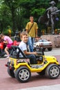 Kids in the play area riding a toy car. Nikolaev, Ukraine