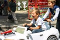 Kids in the play area riding a toy car. Nikolaev, Ukraine