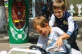 Kids in the play area riding a toy car. Nikolaev, Ukraine