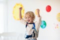 Kids play astronaut. Space and planet child game Royalty Free Stock Photo