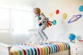 Kids play astronaut. Space and planet child game Royalty Free Stock Photo