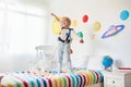 Kids play astronaut. Space and planet child game Royalty Free Stock Photo