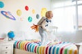 Kids play astronaut. Space and planet child game Royalty Free Stock Photo