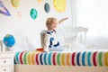 Kids play astronaut. Space and planet child game Royalty Free Stock Photo