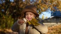 Kids play in autumn park. Children throwing yellow leaves. Child boy with oak and maple leaf outdoor. Fall foliage Royalty Free Stock Photo