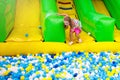 Kids play in ball pit. Child playing in balls pool Royalty Free Stock Photo