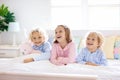 Kids play in bed. Children at home Royalty Free Stock Photo