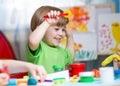 Kids with play clay at home Royalty Free Stock Photo