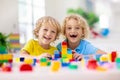 Child playing with toy blocks. Toys for kids Royalty Free Stock Photo