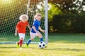 Kids play football. Child at soccer field. Royalty Free Stock Photo