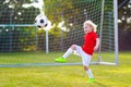 Kids play football. Child at soccer field Royalty Free Stock Photo