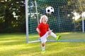 Kids play football. Child at soccer field. Royalty Free Stock Photo