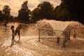 Kids play at fountain in the Frog Pond