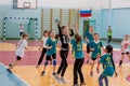 Kids play handball indoor. Sports and physical activity. Training and sports for children