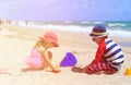 Kids play with sand on summer beach Royalty Free Stock Photo