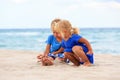 Kids play with sand on summer beach Royalty Free Stock Photo