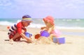 Kids play with sand on summer beach Royalty Free Stock Photo