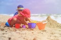 Kids play with sand on summer beach Royalty Free Stock Photo