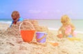 Kids play with sand on summer beach Royalty Free Stock Photo