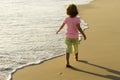 Kids play with sand on summer beach. Happy child boy playing in the sea. Kid having fun outdoors. Summer vacation Royalty Free Stock Photo