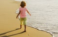 Kids play with sand on summer beach. Happy child boy playing in the sea. Kid having fun outdoors. Summer vacation Royalty Free Stock Photo