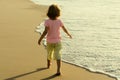 Kids play with sand on summer beach. Happy child boy playing in the sea. Kid having fun outdoors. Summer vacation Royalty Free Stock Photo