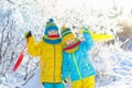 Kids play in snow. Winter sled ride for children Royalty Free Stock Photo