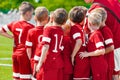 Kids Play Sports. Children Sports Team Standing With Coach United Royalty Free Stock Photo