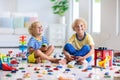 Kids play with toy cars. Children playing car toys Royalty Free Stock Photo