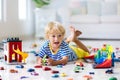 Kids play with toy cars. Children playing car toys Royalty Free Stock Photo