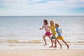 Kids play on tropical beach. Sand and water toy Royalty Free Stock Photo