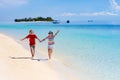 Kids play on tropical beach. Sand and water toy Royalty Free Stock Photo