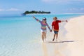 Kids play on tropical beach. Sand and water toy Royalty Free Stock Photo