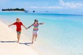 Kids play on tropical beach. Sand and water toy Royalty Free Stock Photo