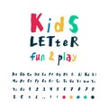 Kids playful style font design. Childish alphabet letters, signs and symbols, numbers. Hand drawn alphabet. Colored and dark blue Royalty Free Stock Photo