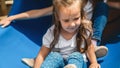 Kids on playground. Children play outdoor on school yard slide. Kid playing in sunny park. Child girls having fun on colorful Royalty Free Stock Photo