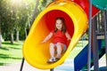 Kids on playground. Children play in summer park. Royalty Free Stock Photo