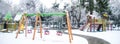 Kids playground in a snowy park