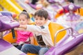 Kids playing in amusement fun park Royalty Free Stock Photo