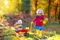 Kids playing in autumn park Royalty Free Stock Photo