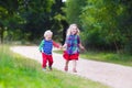 Kids playing in autumn park Royalty Free Stock Photo