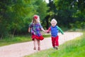 Kids playing in autumn park Royalty Free Stock Photo