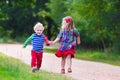 Kids playing in autumn park Royalty Free Stock Photo