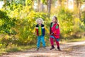 Kids playing in autumn park Royalty Free Stock Photo