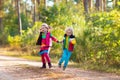 Kids playing in autumn park Royalty Free Stock Photo