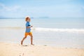 Kids playing on beach. Children play at sea Royalty Free Stock Photo