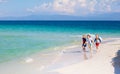 Kids playing on beach. Children play at sea